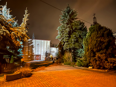 Czestochowa, Poland, February 29, 2024: Church of Divine Providence in Czestochowa, night view. Monument to Saint Pope John Paul II.