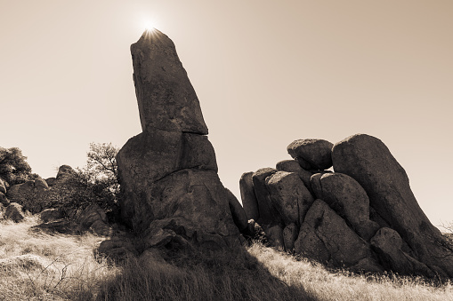 The sculpted boulders of Texas Canyon Nature Preserve shine in morning light.