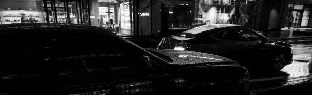 istock BLACK SEDAN AT NIGHT IN CANADA 2143727628