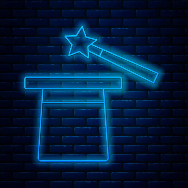 glowing neon line magic hat and wand icon isolated on brick wall background. magic trick. mystery entertainment concept. vector - magic magic trick magician magic wand stock-grafiken, -clipart, -cartoons und -symbole