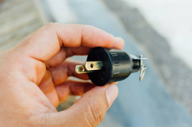 istock black male plug close up 2143784054