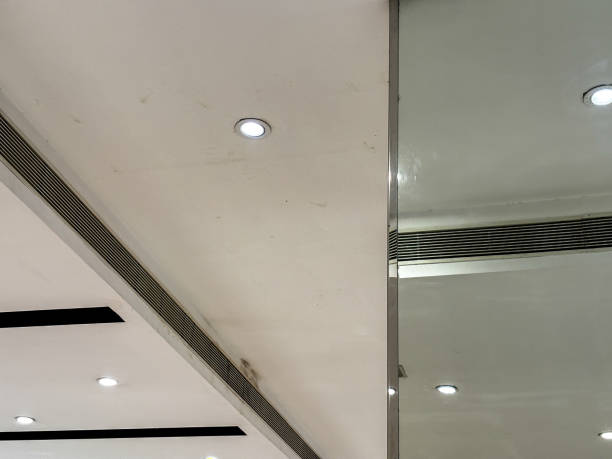 istock The ceiling is white and has a few lights 2143793412