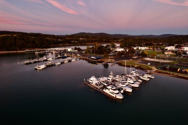 istock A beautiful sunset over a harbour with many boats docked 2143883158