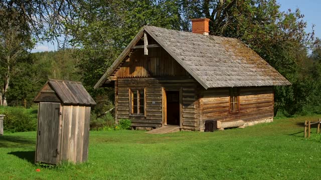 Ancient Toilet Cabin and Log House.