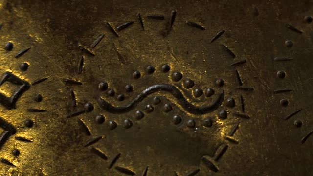 Gold Plate with Engraved Inscriptions and Symbols.