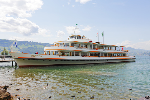 Rapperswil, Switzerland - May 10, 2016: MS Helvetia at the ferry terminal. The ship was built in 1964 and was named Helvetia, meaning the female personification of Switzerland.