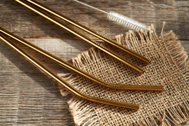 istock Golden stainless steel straws with a brush. Zero waste. 2144076949