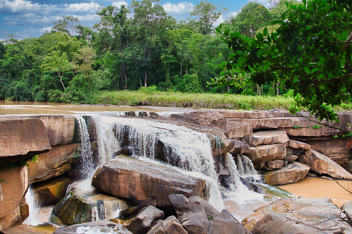 The Kaeng Sopha Waterfall (Namtok Kaeng Sopha) in the river Wang Thong, in the jungle of national park Thung Salaeng Luang in the province of Phitsanulok, Thailand