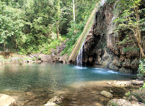 Cocos River waterfall, tourist attraction in Samana, eastern coast of the Dominican Republic.