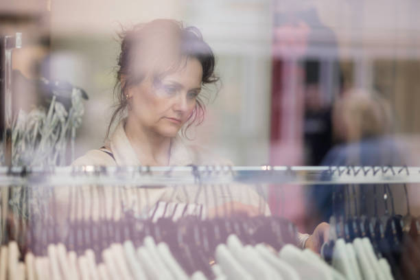 relaxed mature woman shopping in a retail shop