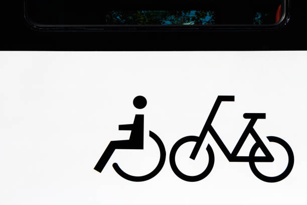 Symbol disabled person and bike under the window of the train.
