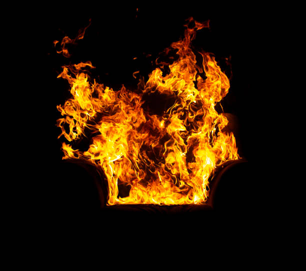 istock burning office chair on a black isolated background, all in fire and smoke 2144311097