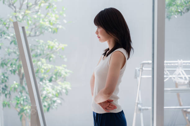 istock Young women who are concerned about their body shape 2144395105