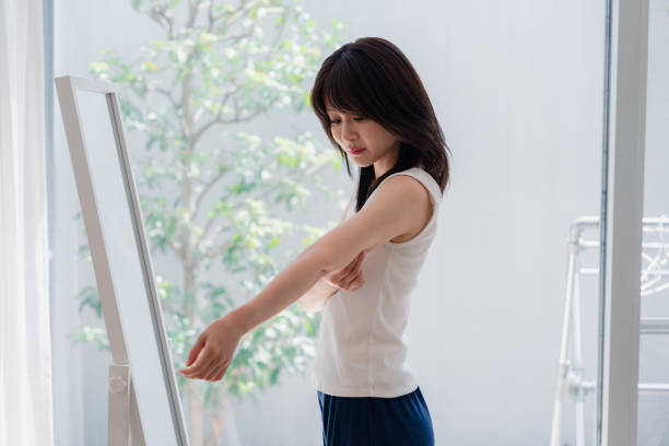 istock Young women who are concerned about their body shape 2144395106