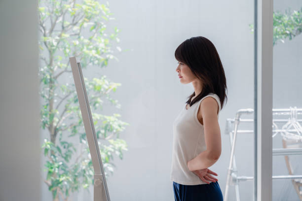 istock Young women who are concerned about their body shape 2144395108