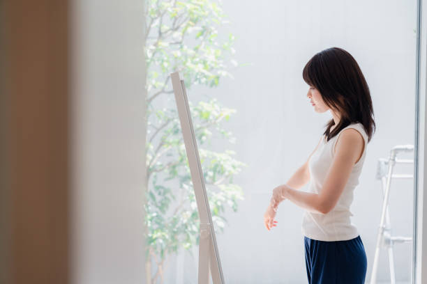 istock Young women who are concerned about their body shape 2144395111