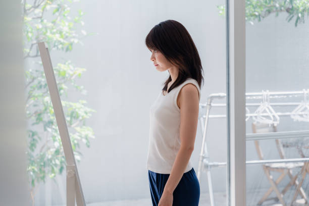 istock Young women who are concerned about their body shape 2144395112