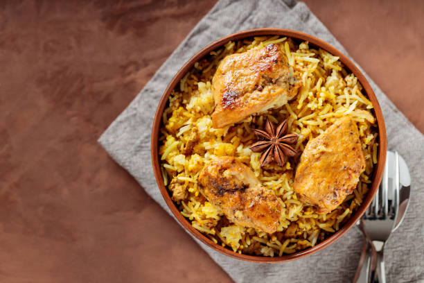 istock Delicious Indian Dish Chicken Biryani with Basmati Rice in Bowl, Top View, Copy Space 2144439461