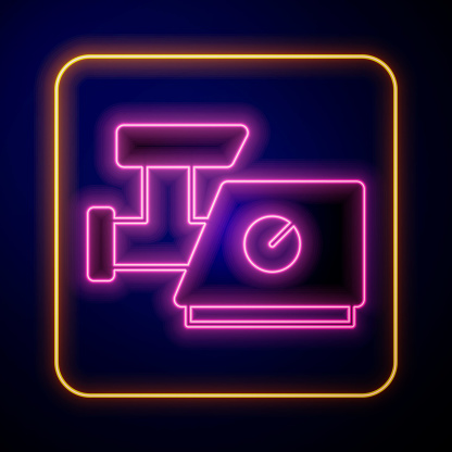 Glowing neon Kitchen meat grinder icon isolated on black background. Vector.