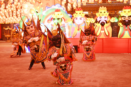 Samut Prakan , Thailand - February 17 , 2024 : Five warlord gods dance on Chinese New Year's Day. At the Dhammakatayu Foundation Shrine or Dhammakatayu Temple or Xianlu Tai Tiang Kong Temple on February 17 , 2024 .