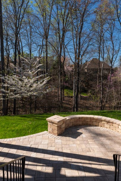 istock Backyard View with Concrete Pavers in the Springtime 2144609515