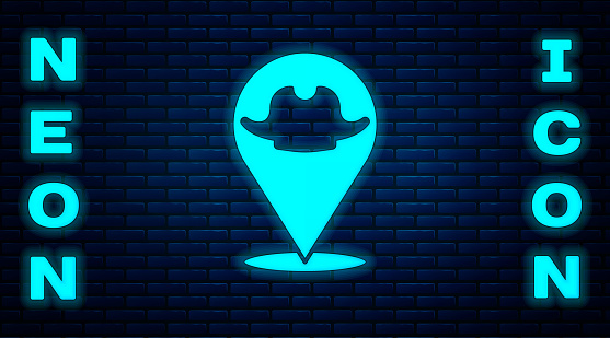 Glowing neon Location pirate icon isolated on brick wall background. Vector.