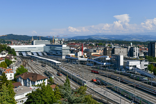 Bern, Switzerland - Aug 10, 2022: Aerial view of the tracks leading into the Bern Train Station in Switzerland.