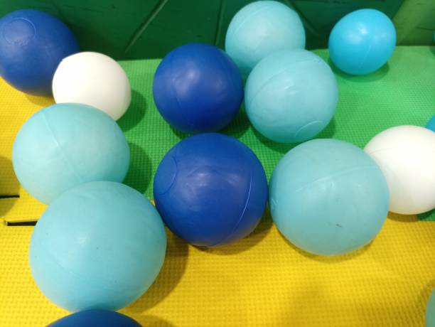 istock Blue, light blue and white plastic ball toys 2144815692