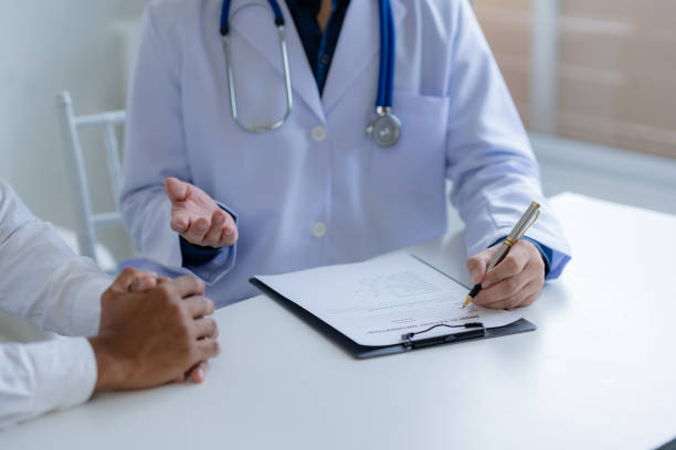 istock Doctor and patient are discussing consultation about symptom problem. Doctor explained the patient's condition and how to care for the patient in detail. 2144883162