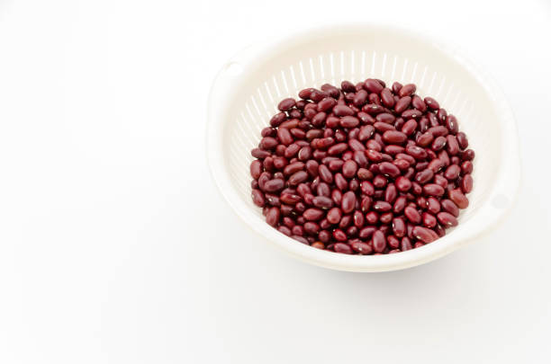 Different types of legumes in bowls - kidney beans