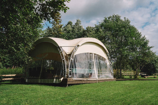 istock Modern Transparent Dome Amidst Lush Greenery 2145068899