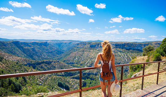 Woman tourist enjoying panoramic view of mountain- Travel, tourism,vacation- France, Cirque de navacelles