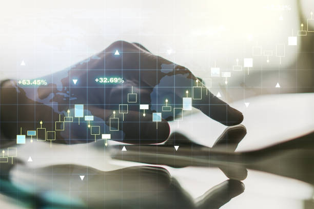 istock Multi exposure of abstract financial graph with world map and hand working with a digital tablet on background, financial and trading concept 2145108958