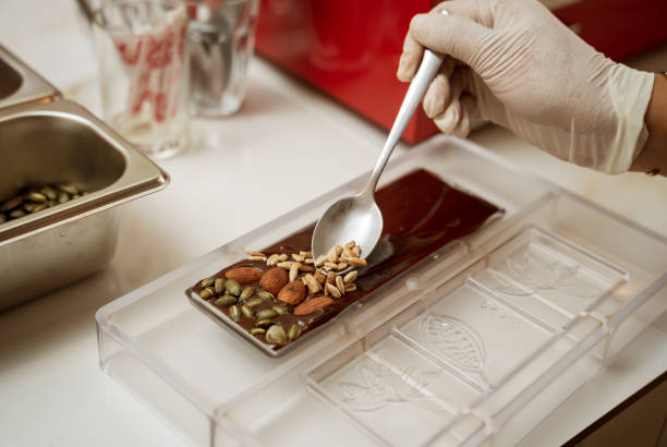 istock Ingredients for making handmade chocolates and candies in a workshop 2145111582