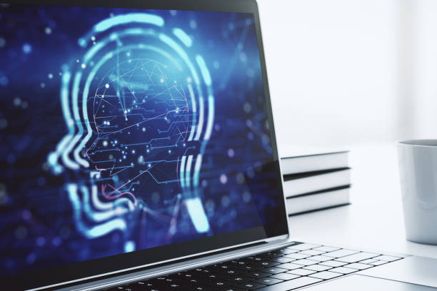 istock Creative artificial Intelligence concept with human head hologram on modern laptop screen. 3D Rendering 2145115736