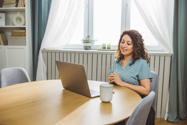 istock Woman Having A Doctor's Appointment Online At Home 2145171288
