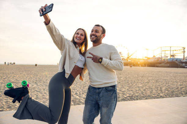 istock Selfie by the beach on roller skates 2145213425