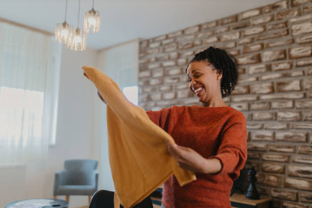 istock Women unpacking items from online shopping 2145228558
