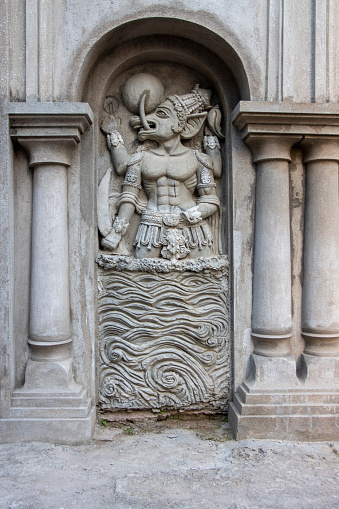 Facade of the Bawali Krishna temple with demon statue, Bawali, West Bengal, India, Asia