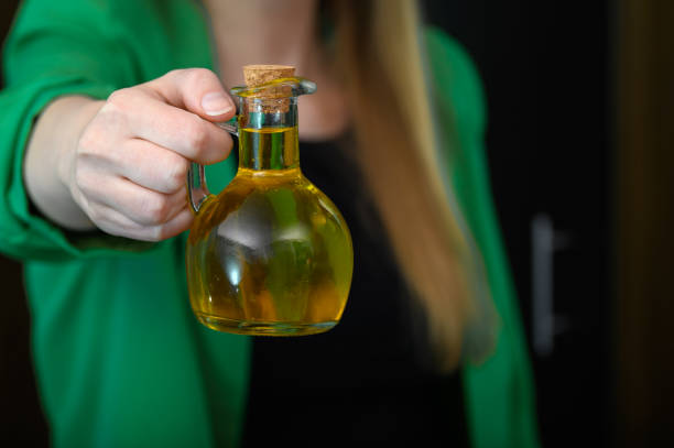 istock Italian olive oil in a small bottle 2145332990