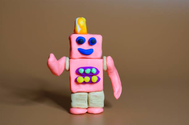 A toy robot made of plasticine. Science and technology.