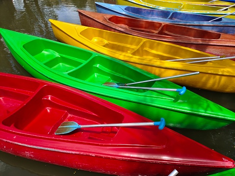 The close up image of a group of colorful Leisure Fiber boats