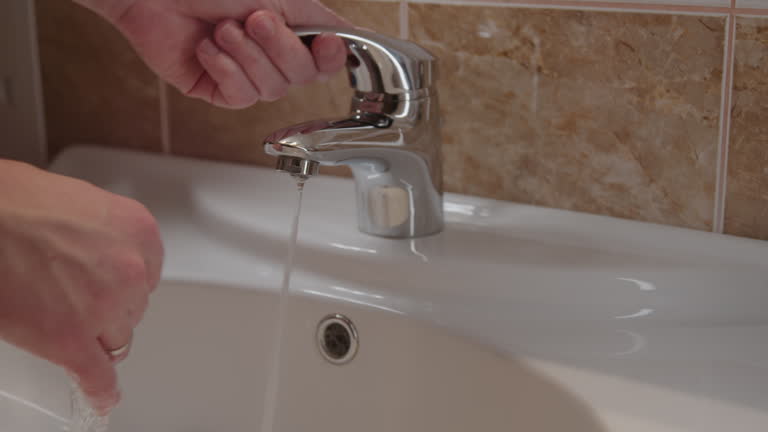 Act of personal hygiene person diligently washing their hands in sink clean skin in promoting healthy lifestyle and preventing transmission of harmful pathogens. Person washing hands.