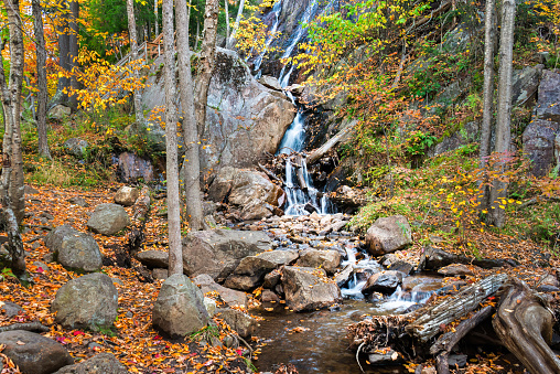 Waterfalls in the forest in autumn. Mont Tremblant, Quebec, Canada.