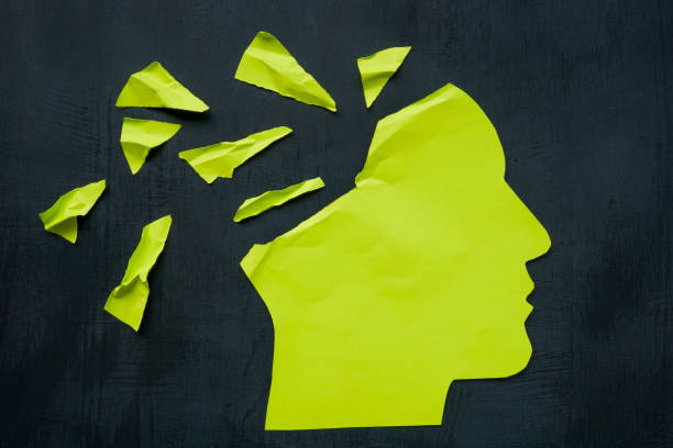 istock Paper head torn as a concept for memory and mental health problems. 2145412849