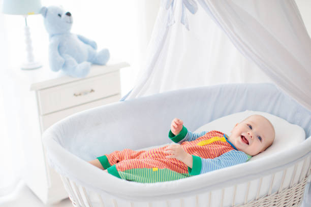 istock Cute baby in white nursery 2145413368
