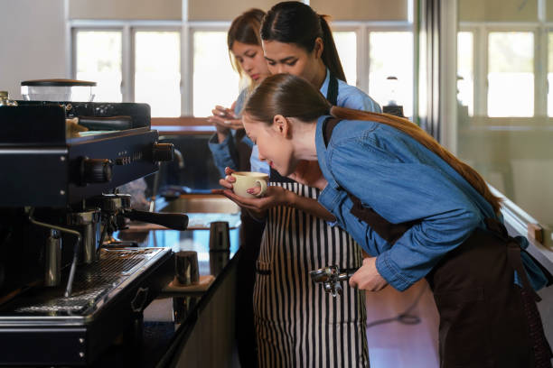 istock Group young woman people leaning and education workshop for classes barista coffee in cafe room. 2145421777