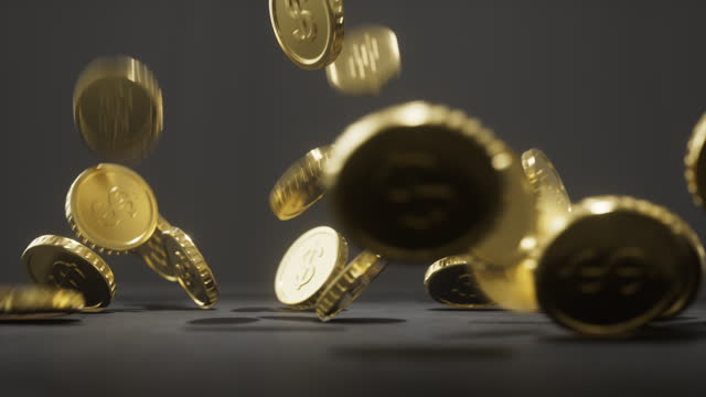 Falling gold coins with dollar symbol