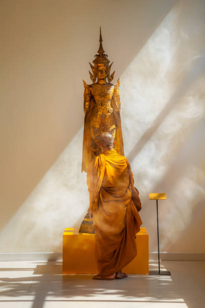 Colorful Ancient Chinese Guanyin Bodhisattva of Compassion Buddhist Statue 1000 AD Honolulu Museum of Art Oahu Hawaii. Guanyin is a person who has acheived a high level of spiristual advancement and is dedicating to helping others from suffering.