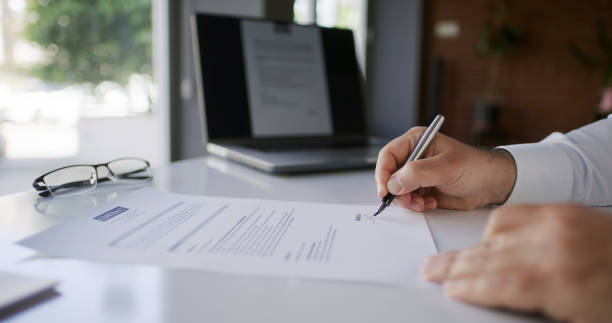 istock Businessman Signing Contract In The Office 2145476417